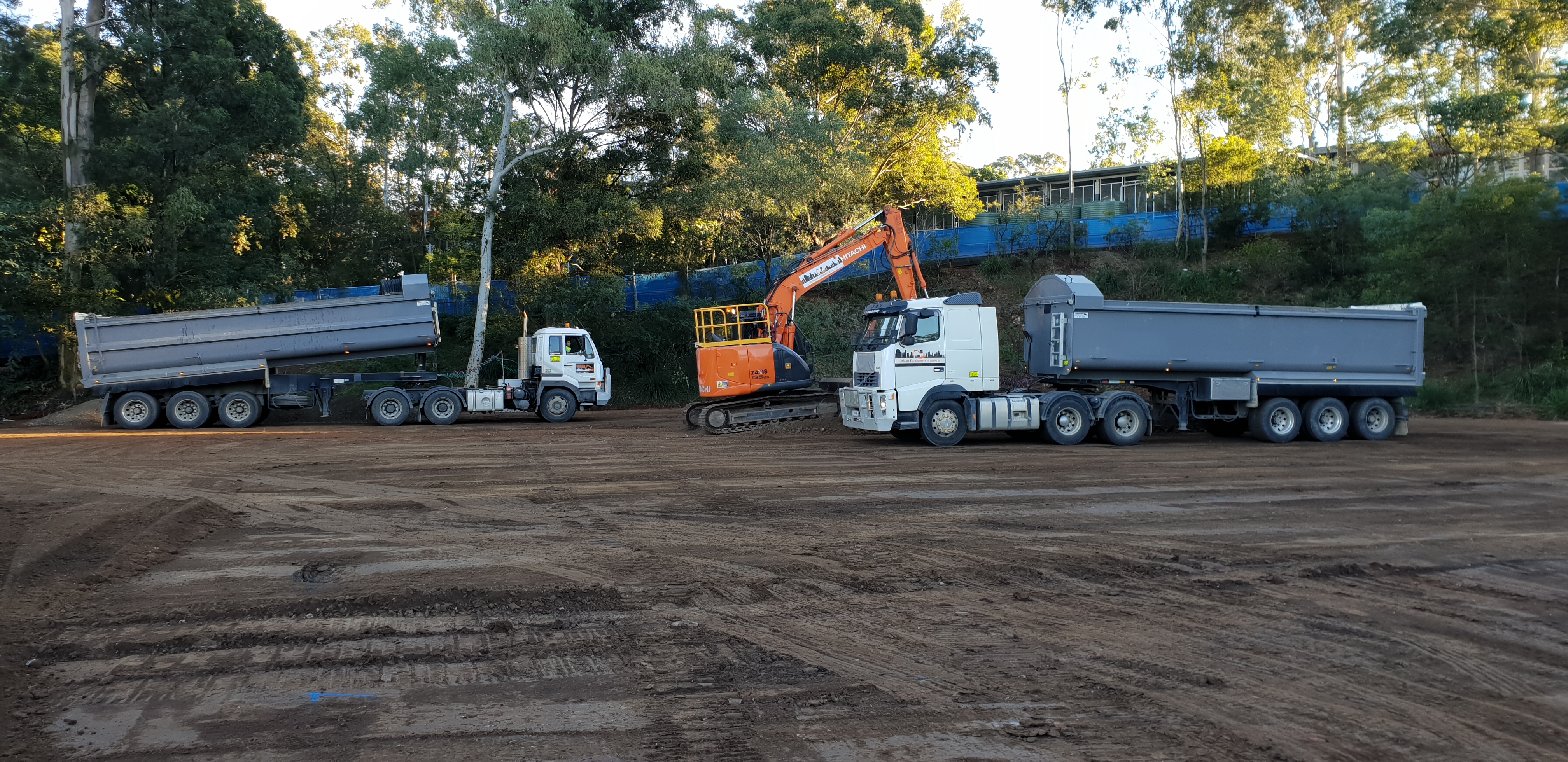 Cavendish Road SHS Excavator successfully scooping all the debris into two large trucks