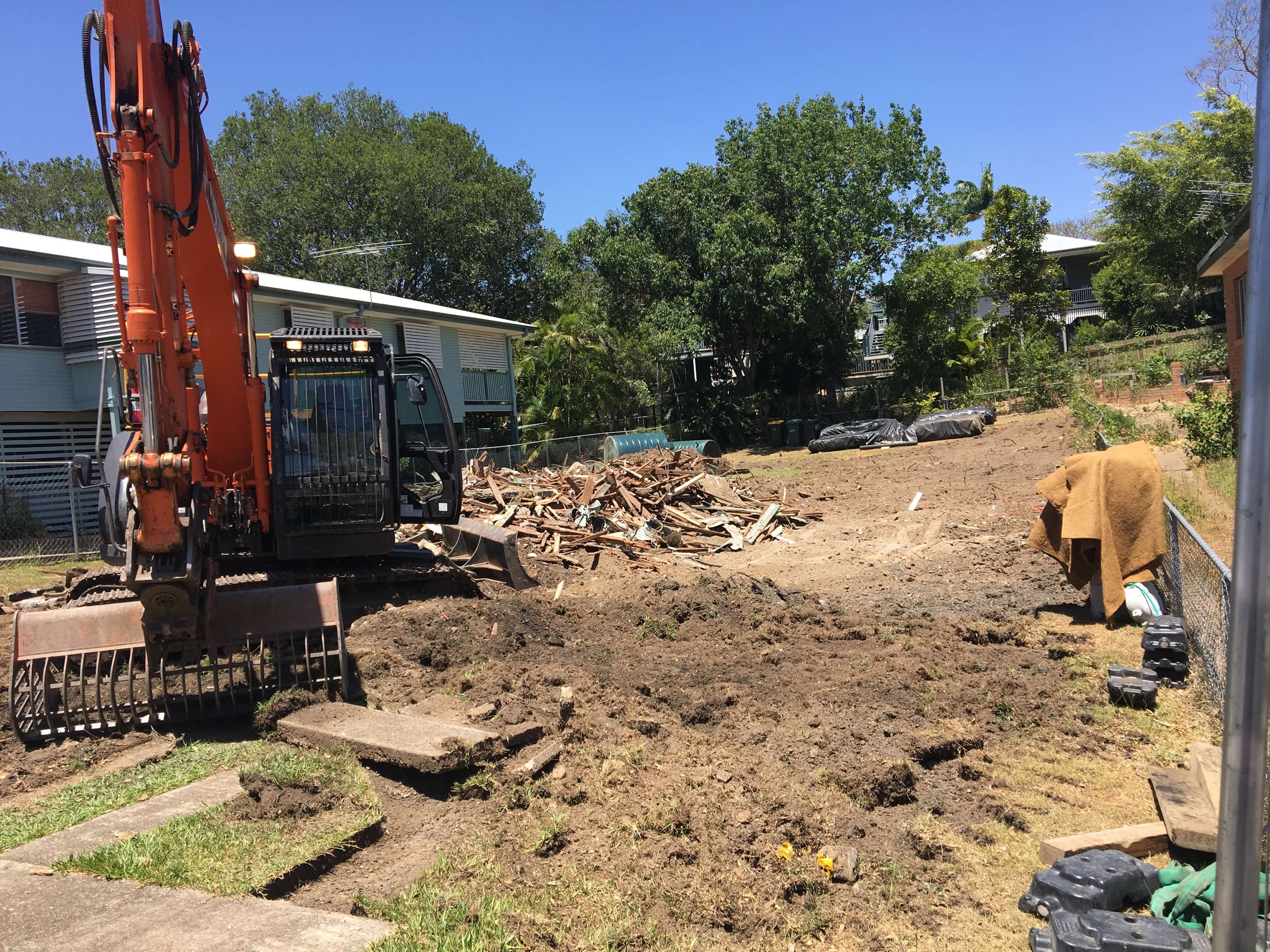 A completed demolition area with remaining debris
